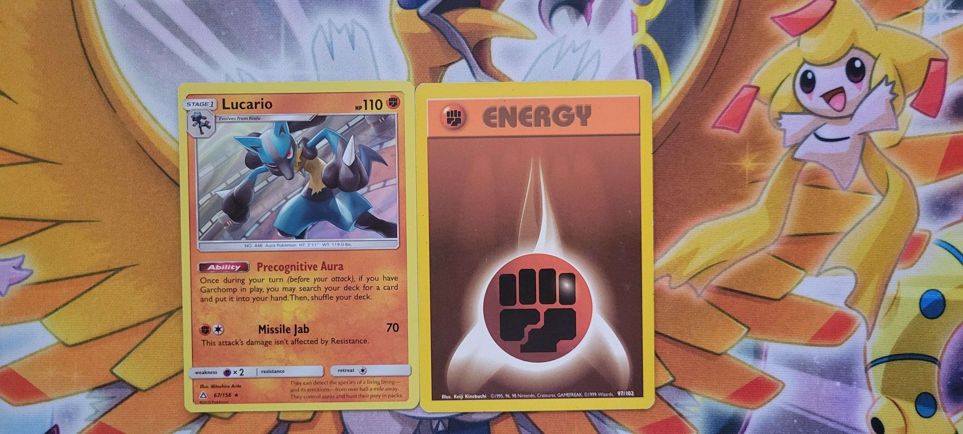 A Fighting-type Pokémon beside a Fighting Energy card.