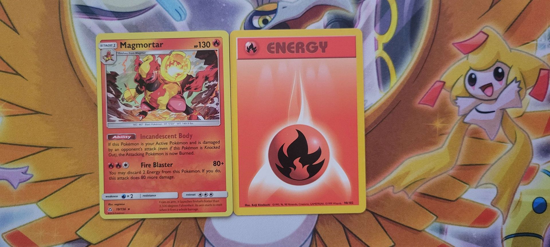 A Fire-type Pokémon beside a Fire Energy card.