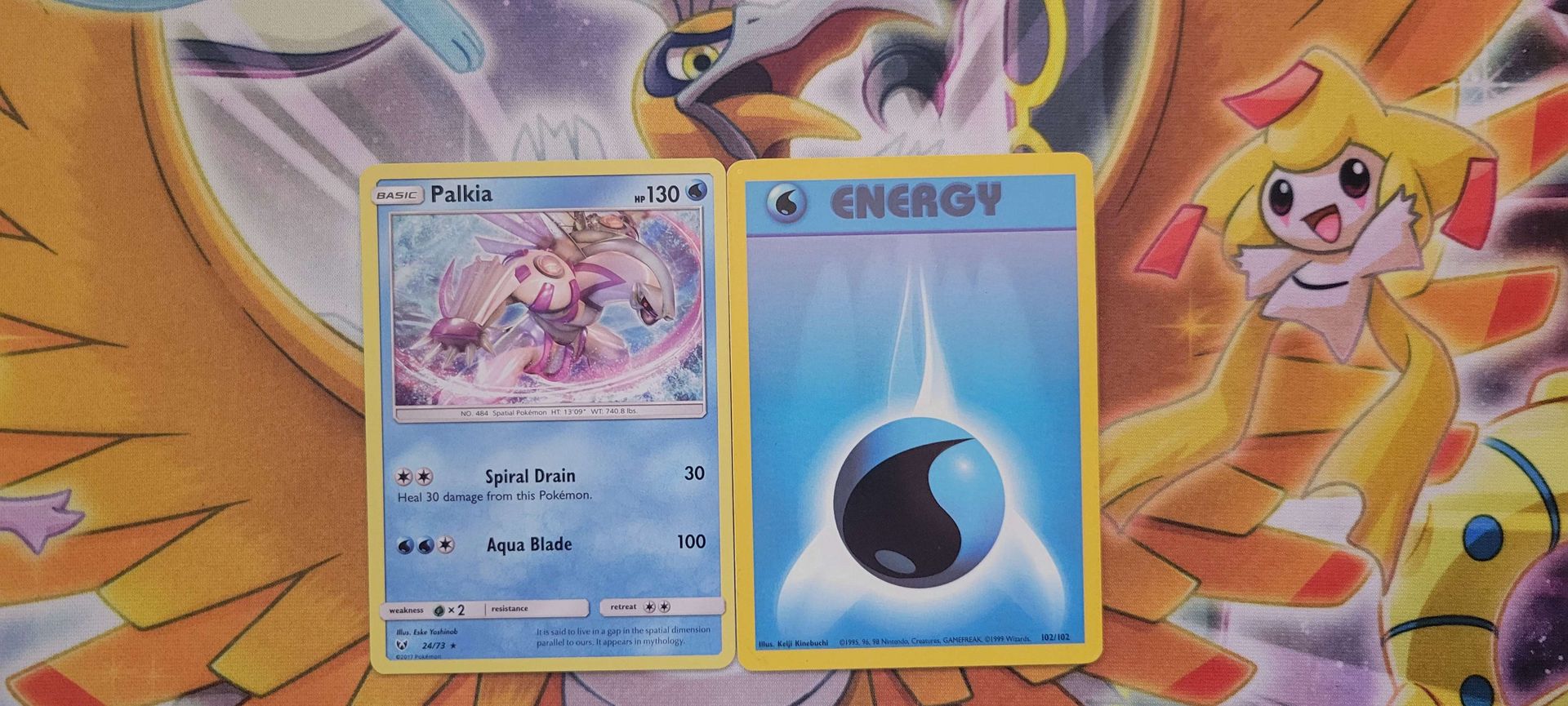 A Water-type Pokémon beside a Water Energy card.