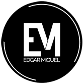 O logotipo de edgar miguel está em um círculo preto.