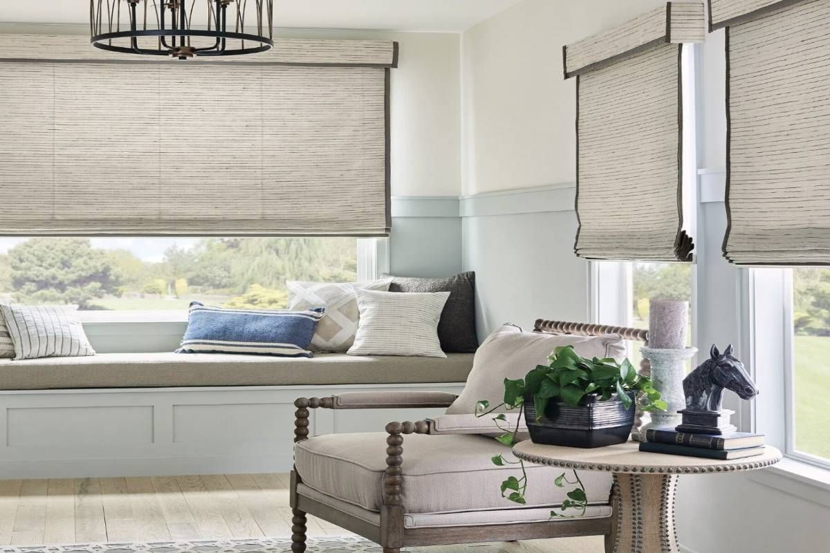 Stylish living room featuring woven roller shades near Manchester, NH