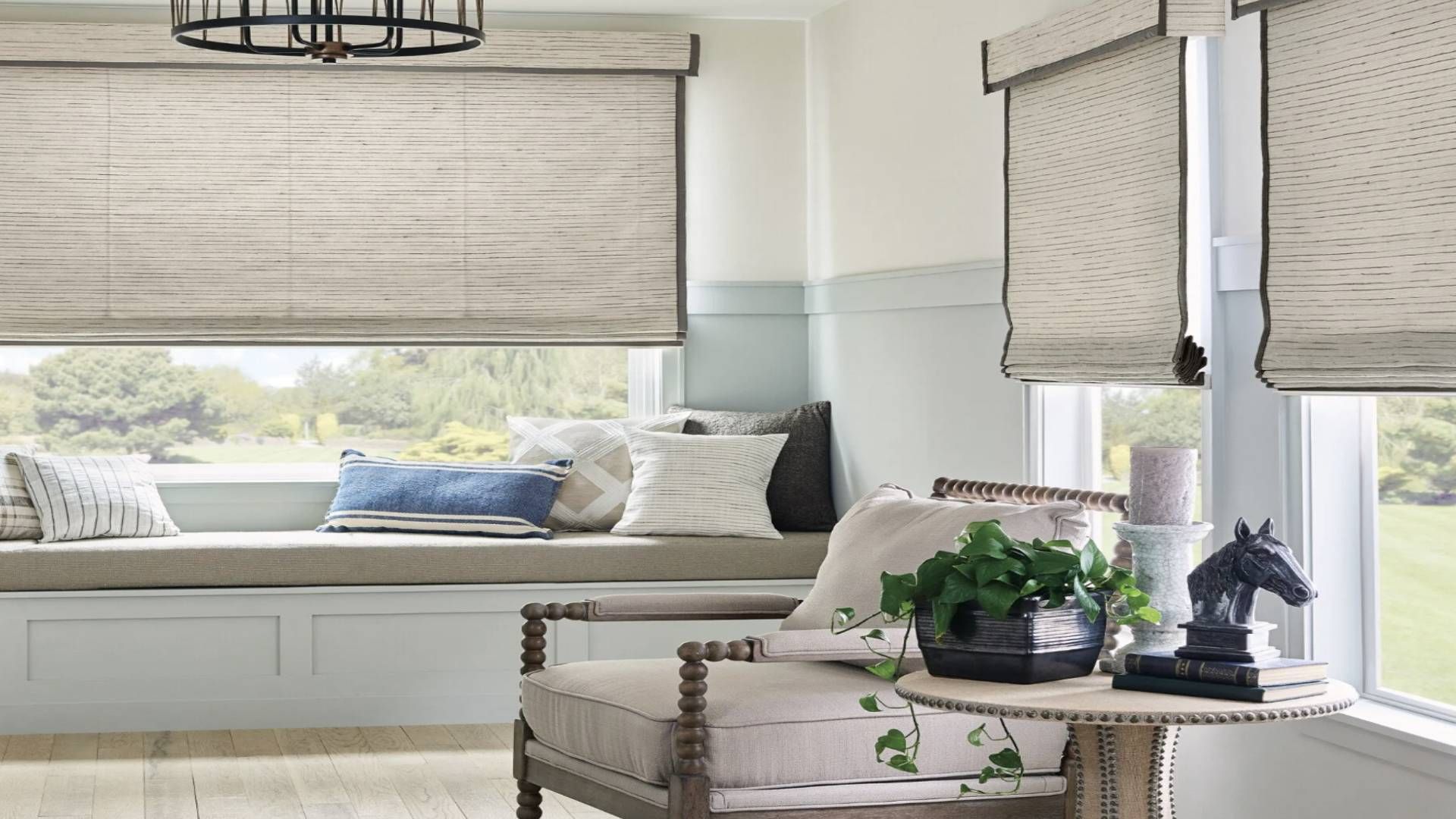 Stylish living room featuring woven roller shades near Manchester, NH