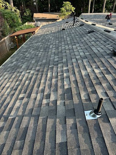 A close up of a roof with shingles on it.
