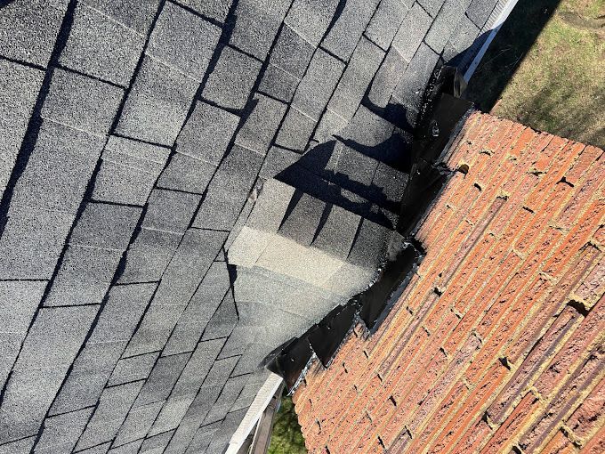 A close up of a roof with a hole in it.