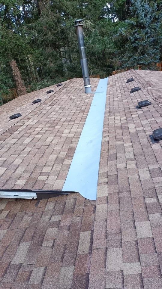 A roof with a lot of plywood on it is being repaired.