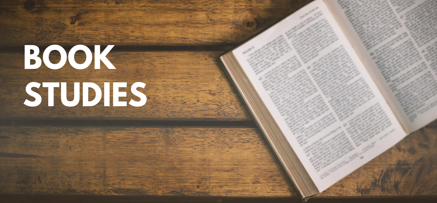 Open book on wooden surface with 