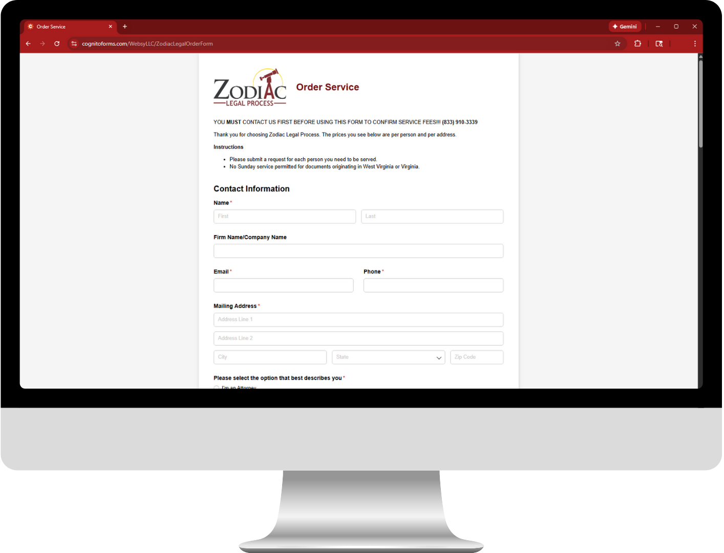 Computer monitor displaying a webpage with the Zodiac logo and a form to submit interest.