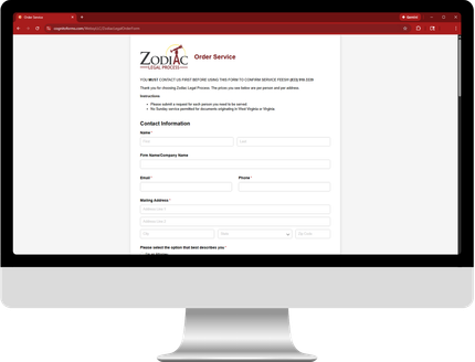 Computer monitor displaying a webpage with the Zodiac logo and a form to submit interest.