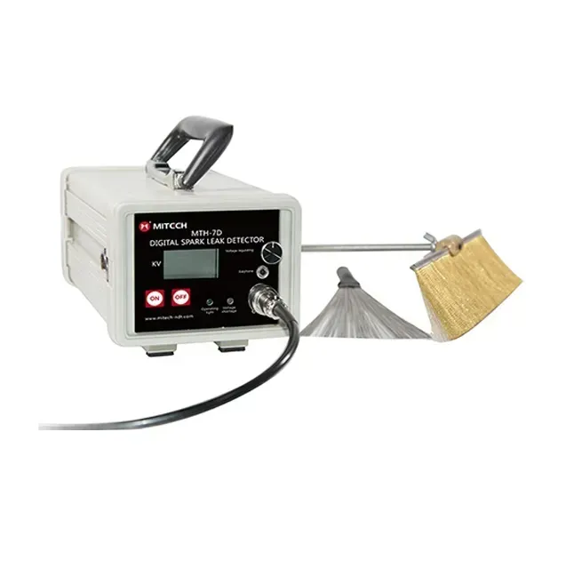 Detector digital de chispas con pantalla, asa y electrodo tipo cepillo.