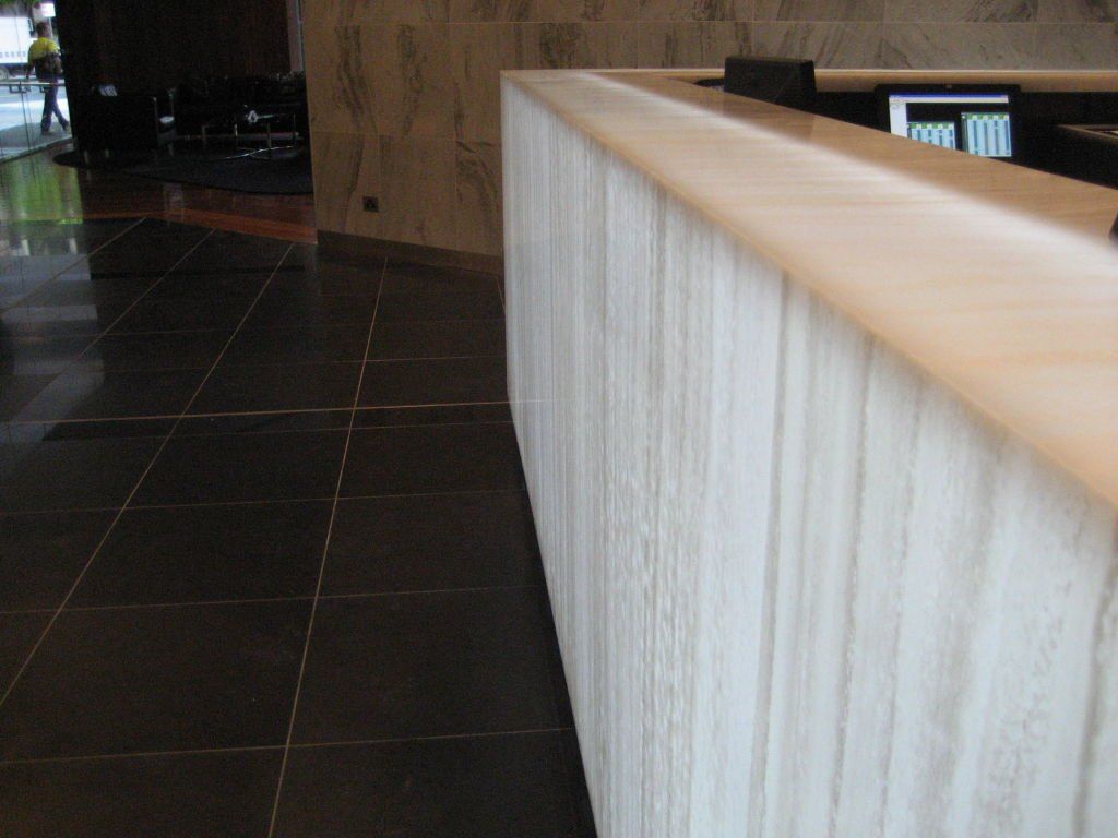 solid surface reception desk in office