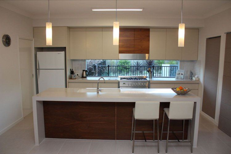full modern kitchen with solid surface counter tops