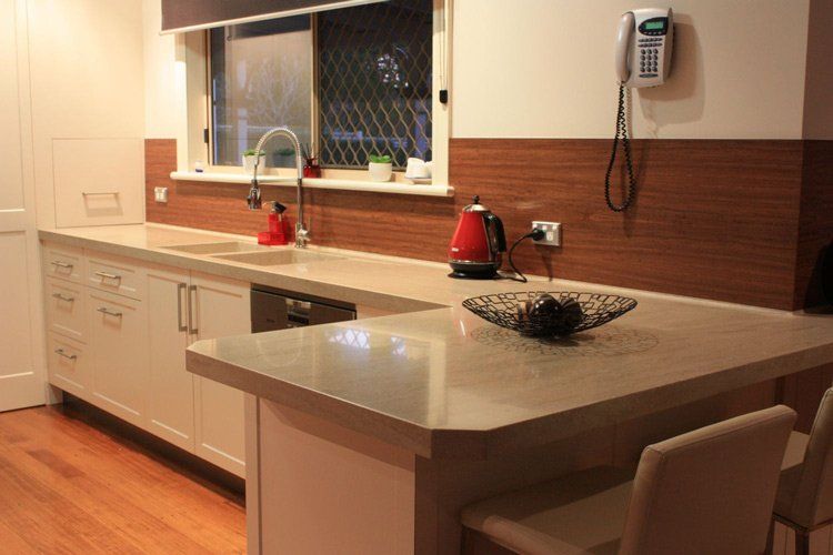 solid surface counter tops with brown back splash