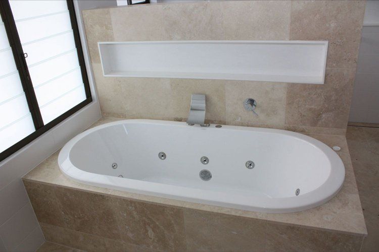 white solid surface bath with jets