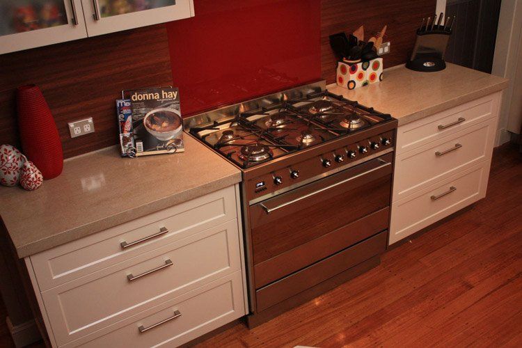 tan solid surface with stove top
