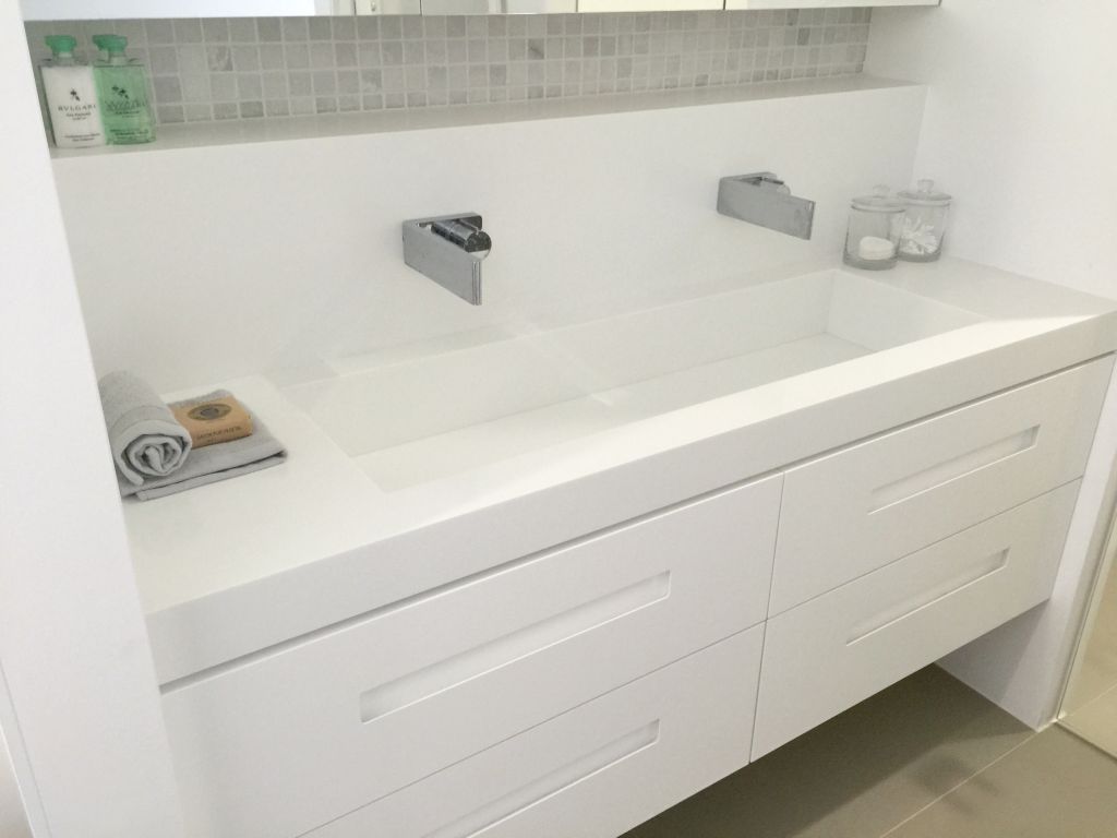 solid surface bathroom sink and faucet