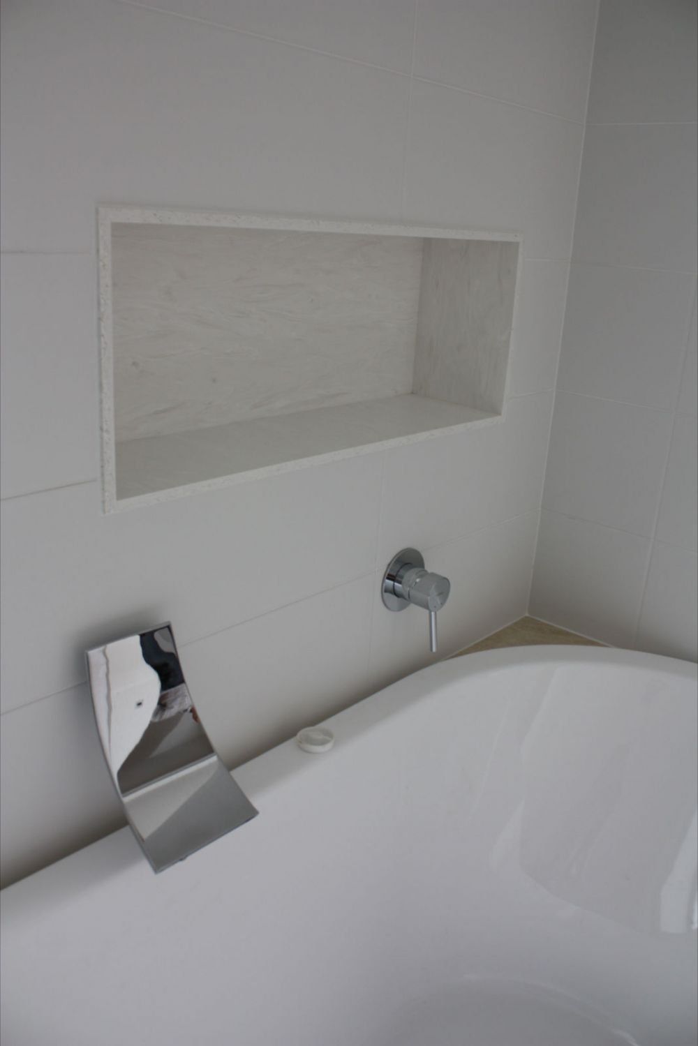 white solid surface bathtub