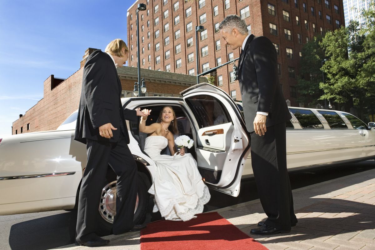 Weddings — Man Assisting Bride in Pensacola, FL