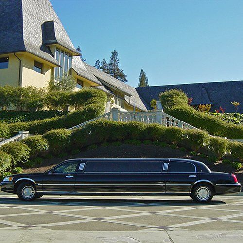 Corporate Travel — Black Limo Side View in Pensacola, FL