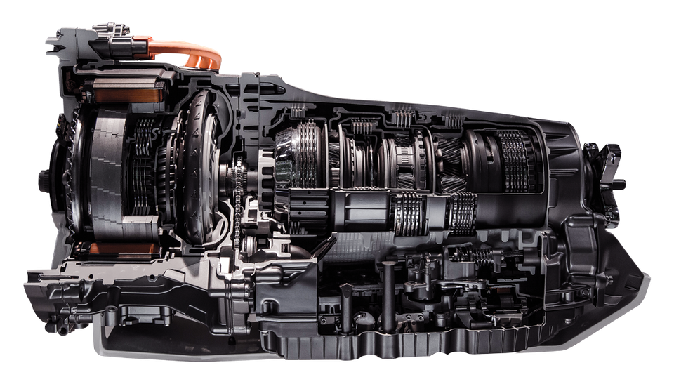A cutaway view of an automotive transmission, showing internal gears and mechanical components in black and metallic gray.
