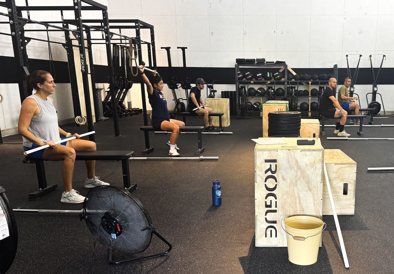Members in barbell class at All Inclusive CrossFit, a welcoming CrossFit gym in Winter Park, FL