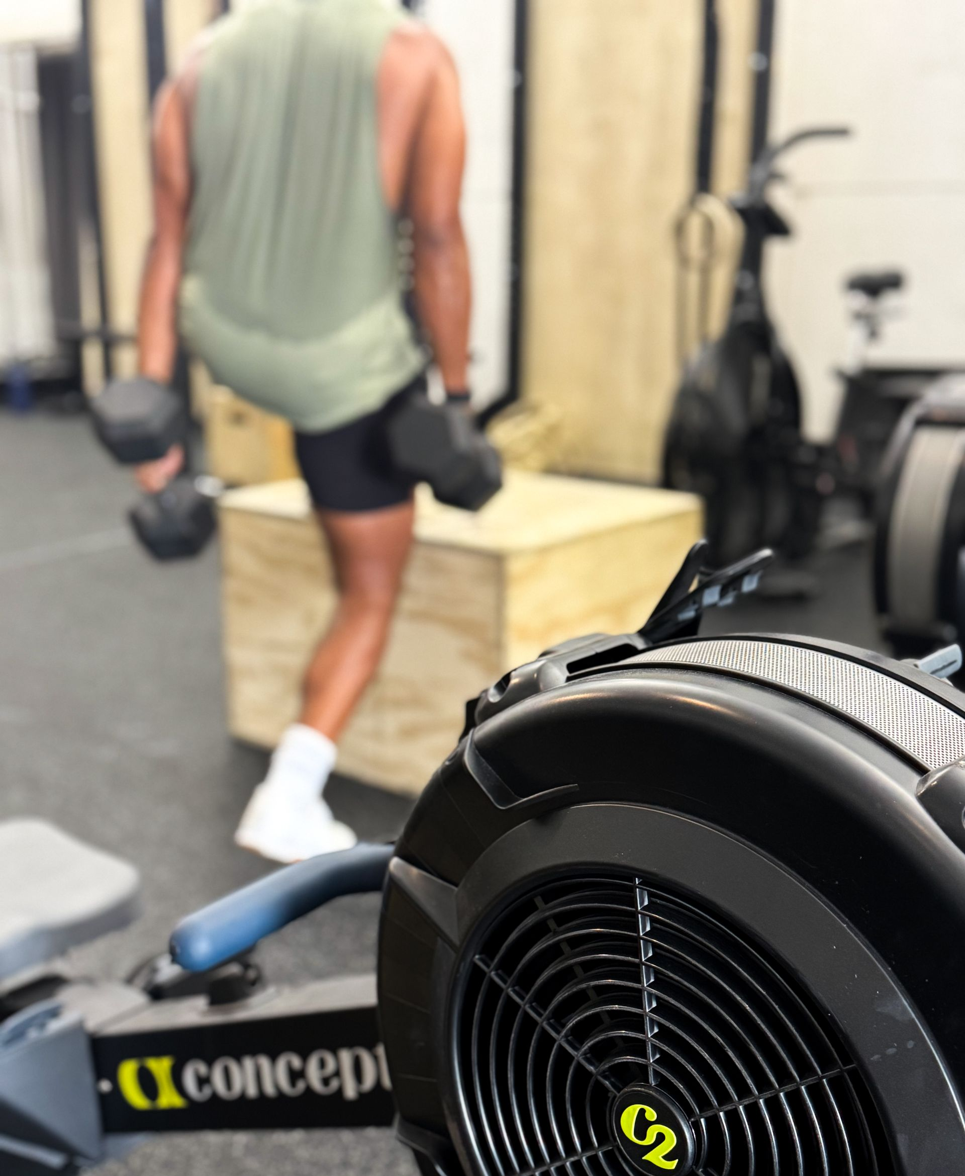 Members performing workouts together in a supportive environment at our CrossFit Winter Park gym.