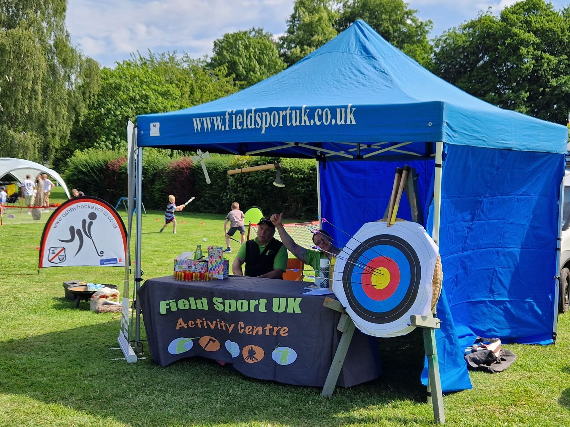 A blue tent with the website www.kidssportuk.co.uk on it