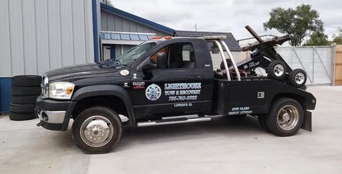 Man calling for a towing services — Lawrence, KS — Lighthouse Tow & Recovery Man calling for a towing services — Lawrence, KS — Lighthouse Tow & Recovery