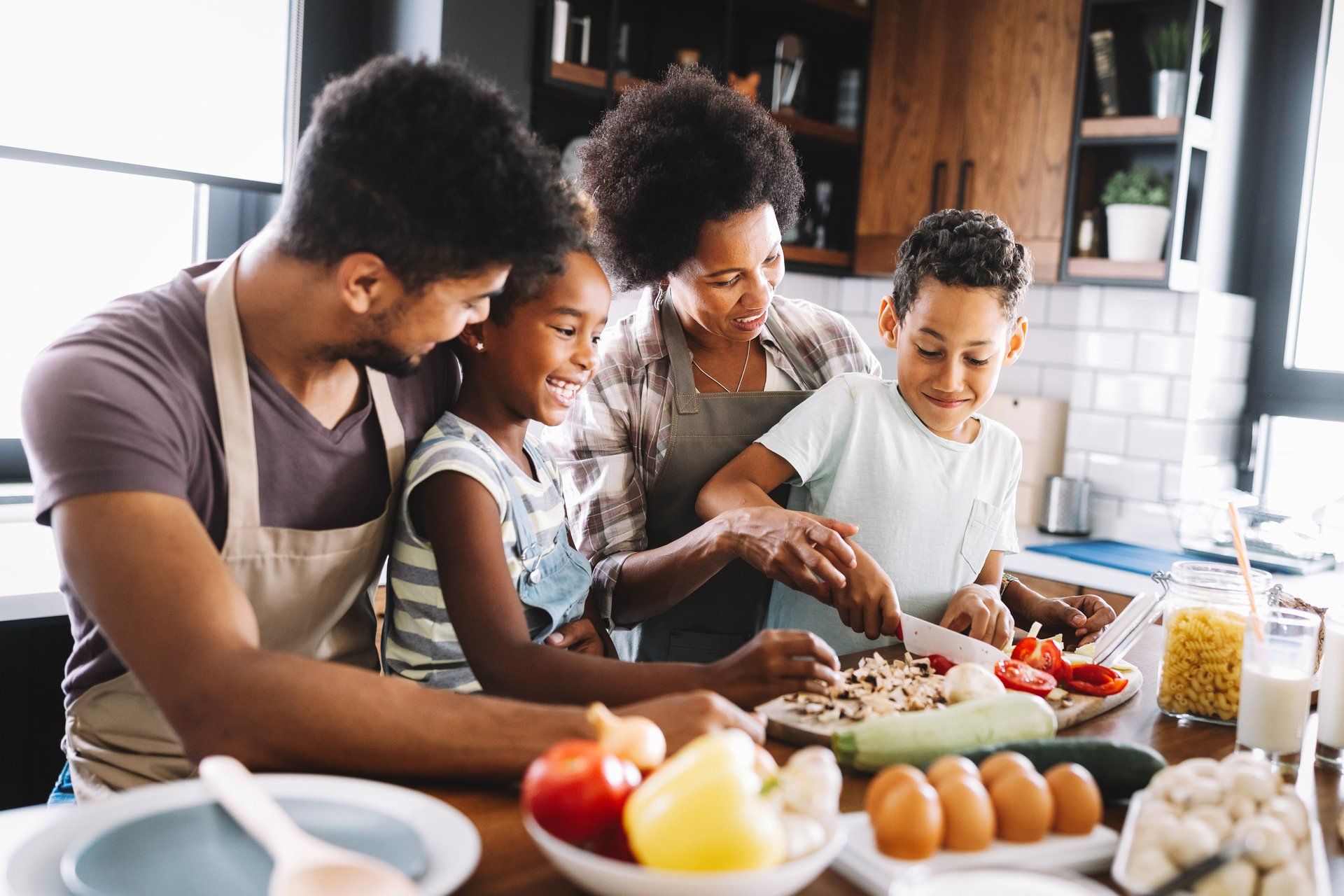 Family Preparing Healthy Food In the Kitchen