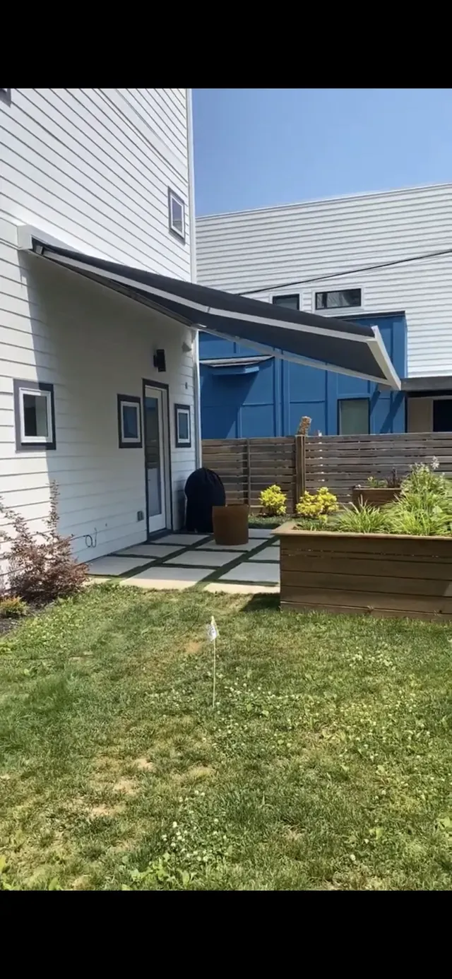 House Backyard with White Siding — Charlotte, NC — We Got You Covered Outdoor