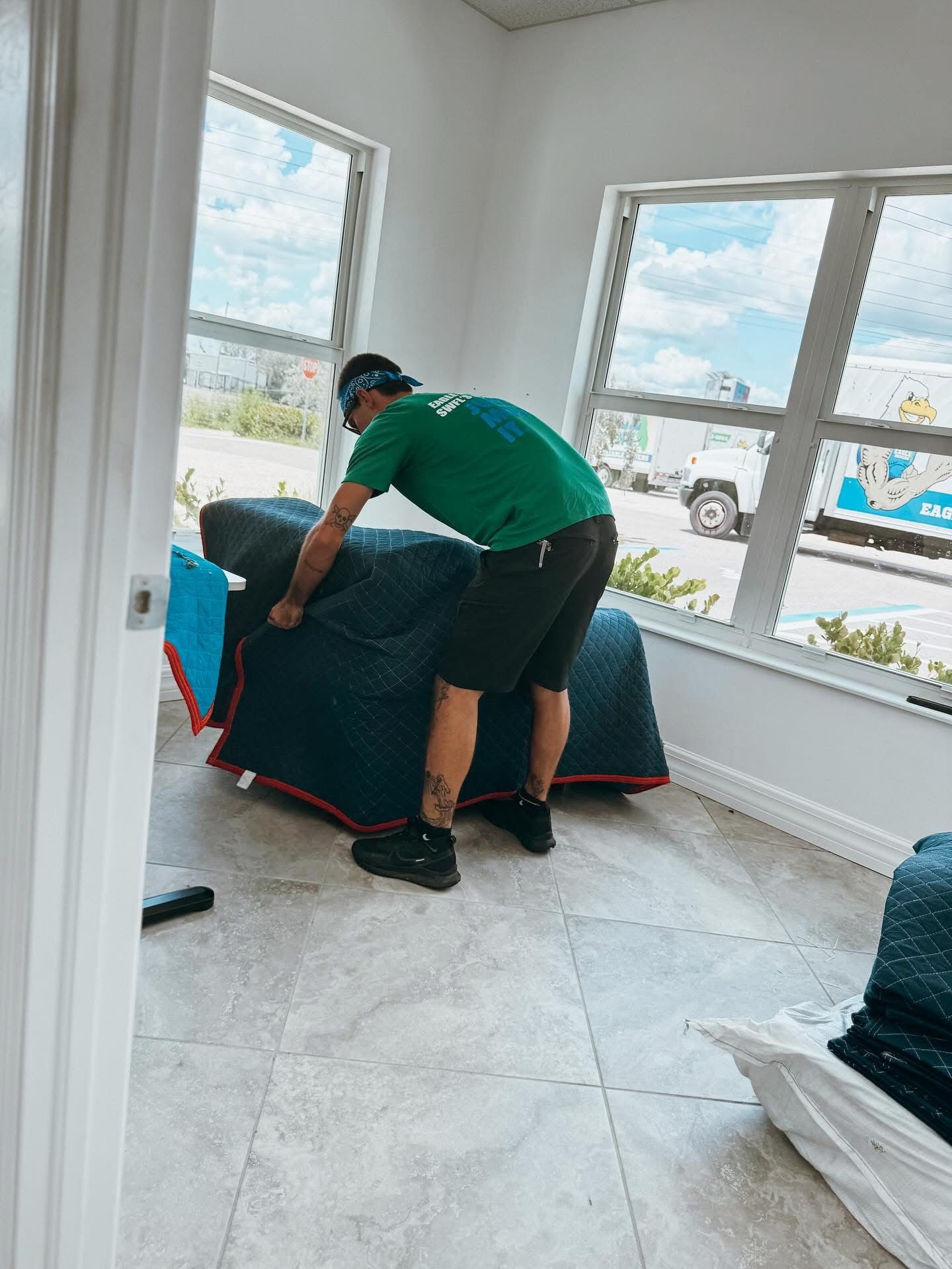Office movers helping a business move out of its old building.