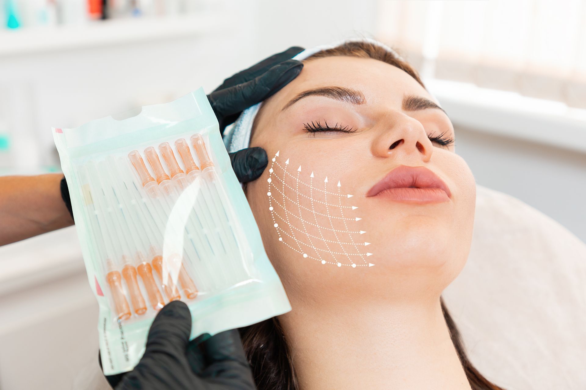 A woman is getting a facial treatment at a beauty salon.