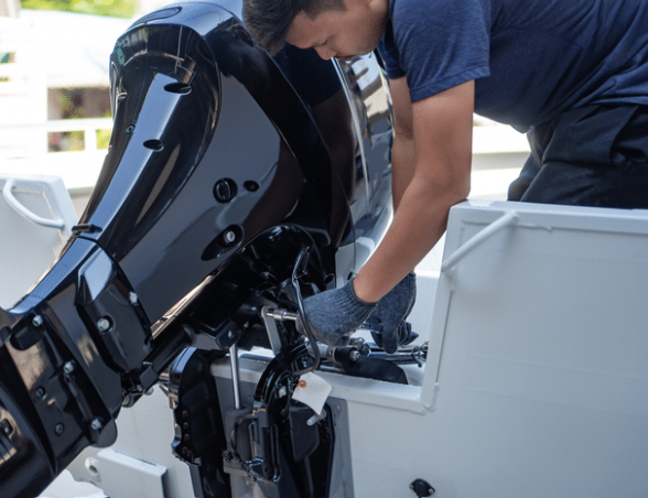Mid-century modern credenza with a lamp and decorative objects, in a sunlit room.