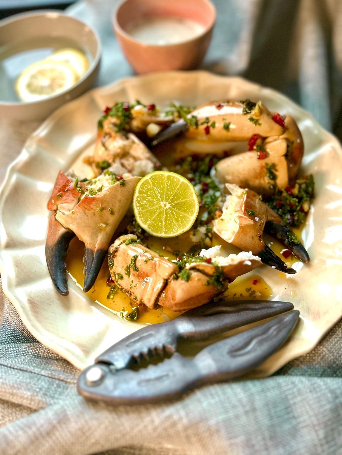 Crab claws with lime mayonnaise and pepper oil