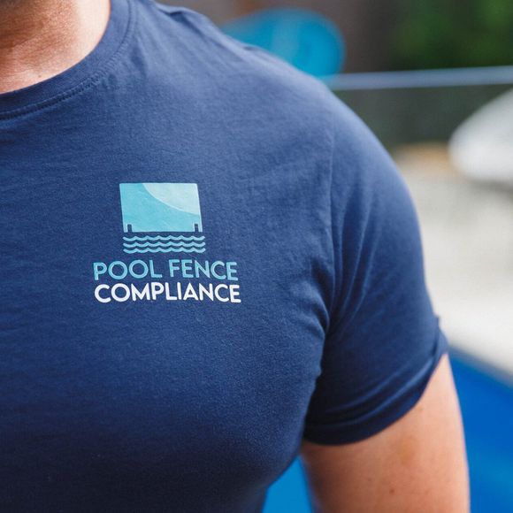 Guy with a Shirt of Pool Fence Compliance