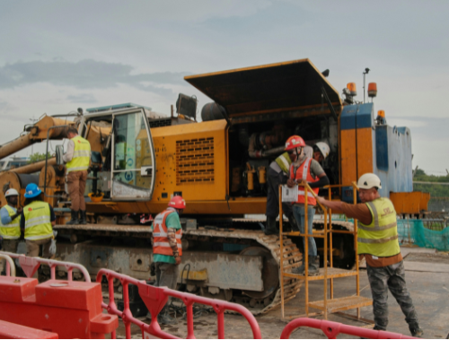 construction HR scene in which a contractor HR hires skilled tradespeople.