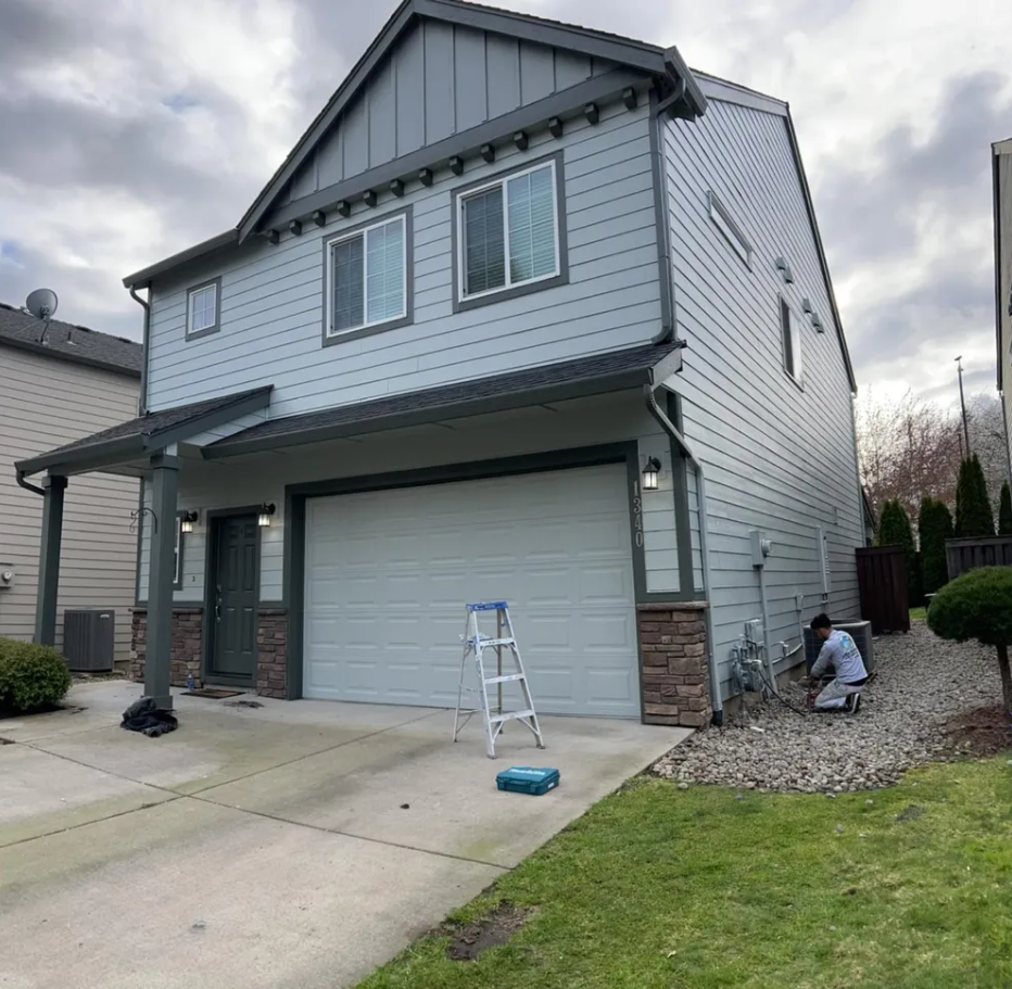 A house with a ladder in front of it