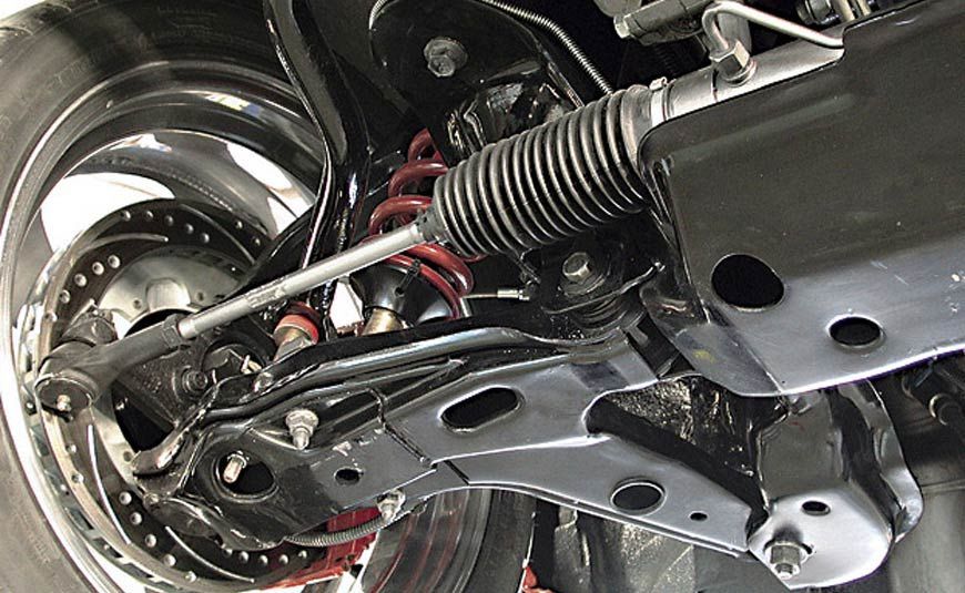 A Close Up of a Car 's Suspension and Steering System — Blackwall Tyre Service & Mechanical Repairs In Blackwall, NSW