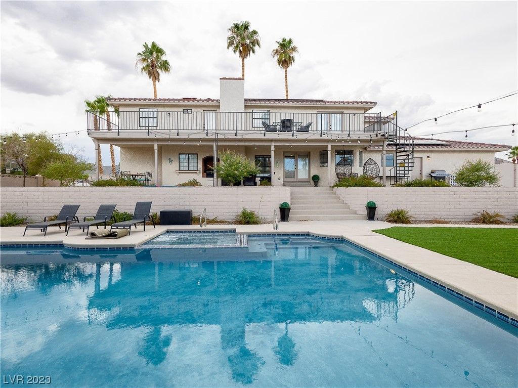 Pool with house infront luxury