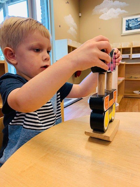 Smart Kid Playing Puzzle — Omaha, NE — Montessori Academy Of West Omaha