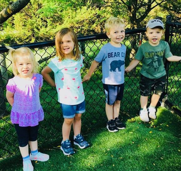 Four Kids Playing Outside — Omaha, NE — Montessori Academy Of West Omaha