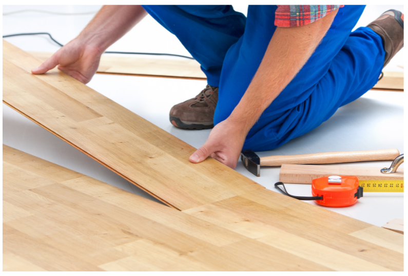 photo of tan hardwood floors being installed