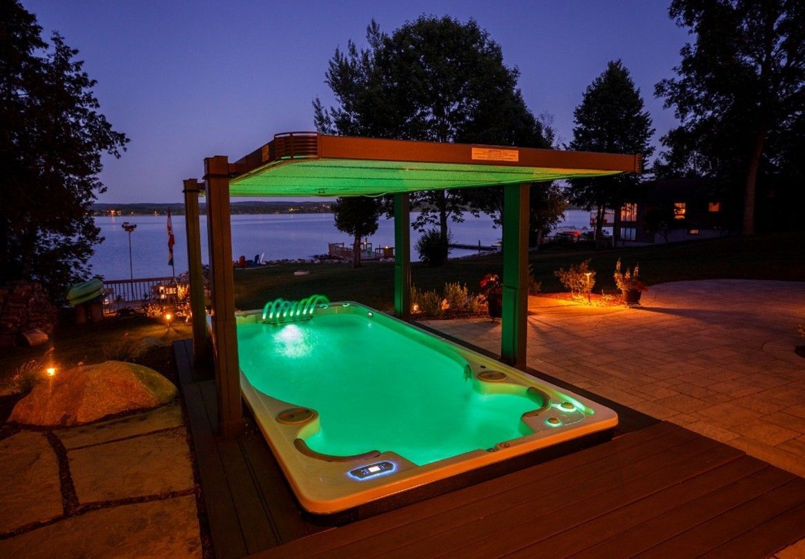 There is a waterfall in the middle of the pool.