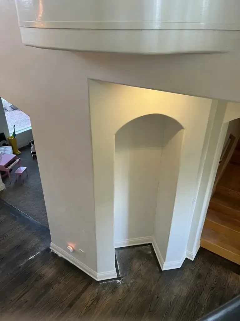 There is a staircase leading up to the second floor of a house.
