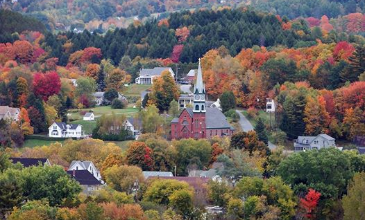 town of Lyndonville Vermont with fall foliage