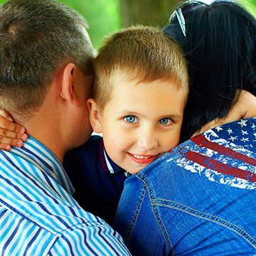 Family Law — Little Boy Hugging Parents in Clearfield, PA