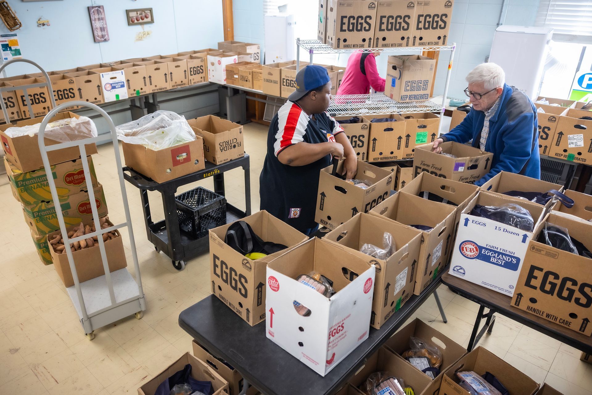 Unload food shipment for the Lord's Pantry