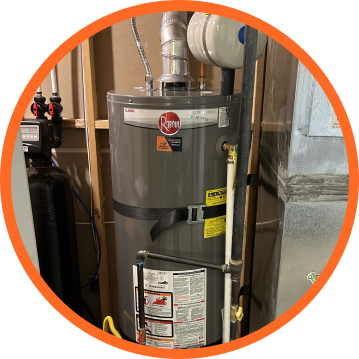 Gray Rheem water heater in a utility room, with pipes and vent.