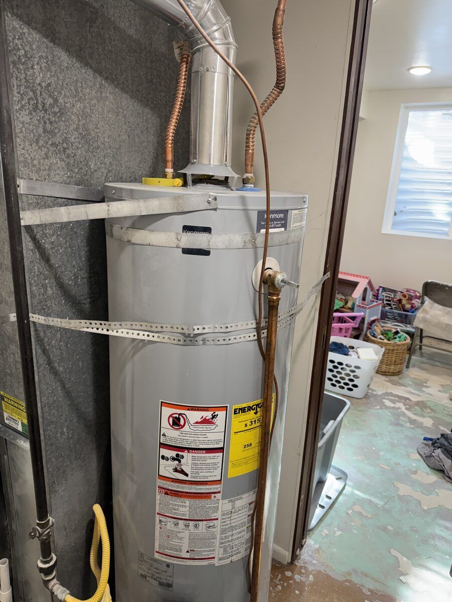 Hard water scale builds up inside a Utah water heater tank like this one