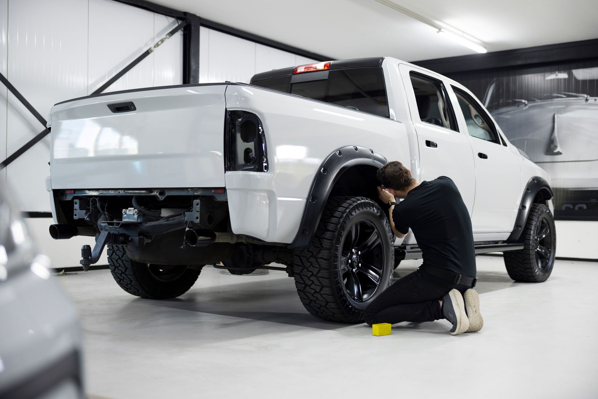 man working on car