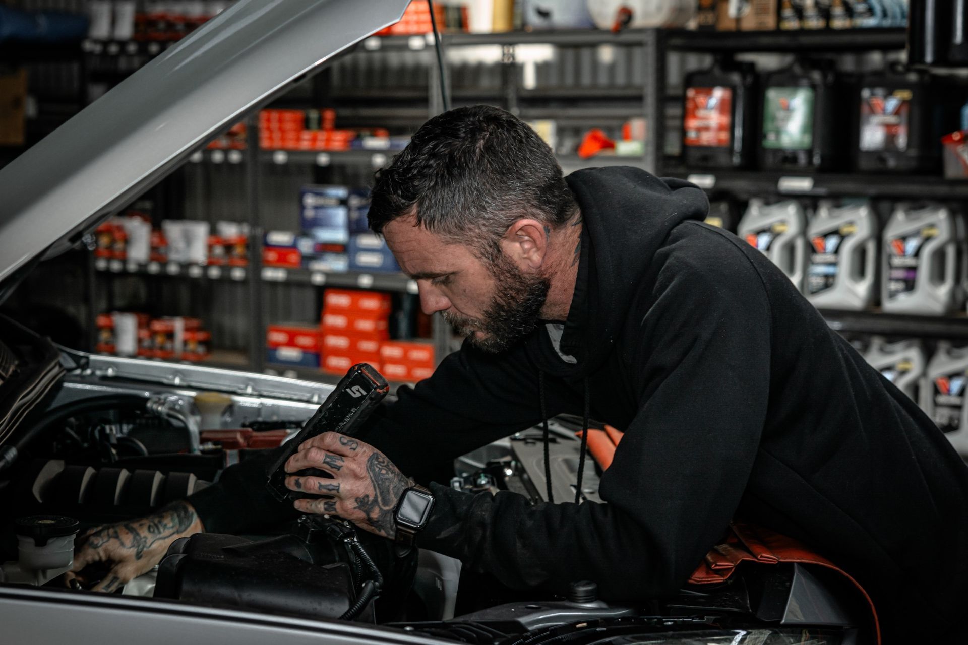 Dubbo Mechanic inspecting the engine of a car